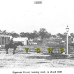 Historic photo of Seymour Street Traralgon with few buildings and man on a horse 1888